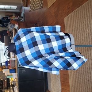 Buffalo plaid pocho/wrap in  blue, black and white.